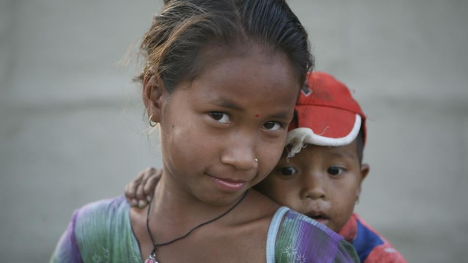 Nepal portraits: a Nepalese girl and her younger brother. Photograph: Alf Berg/Plan