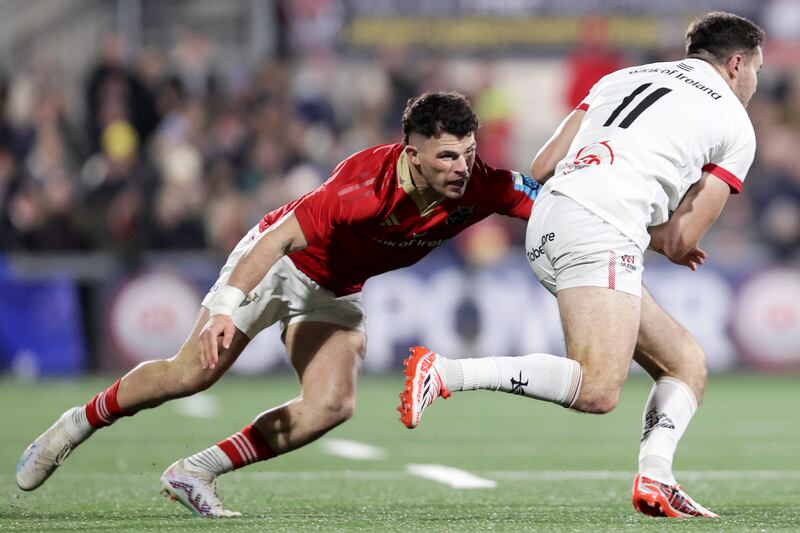 Munster's Calvin Nash and Jacob Stockdale of Ulster. Photograph: Laszlo Geczo/Inpho