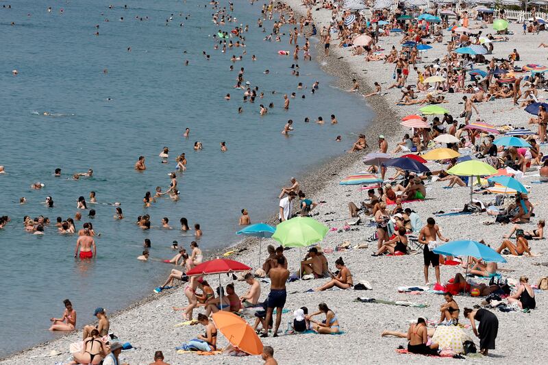People on a beach in Nice, southern France as temperatures reached up to 38 degrees Celsius on Monday. Photograph: Sebastien Nogier/EPA