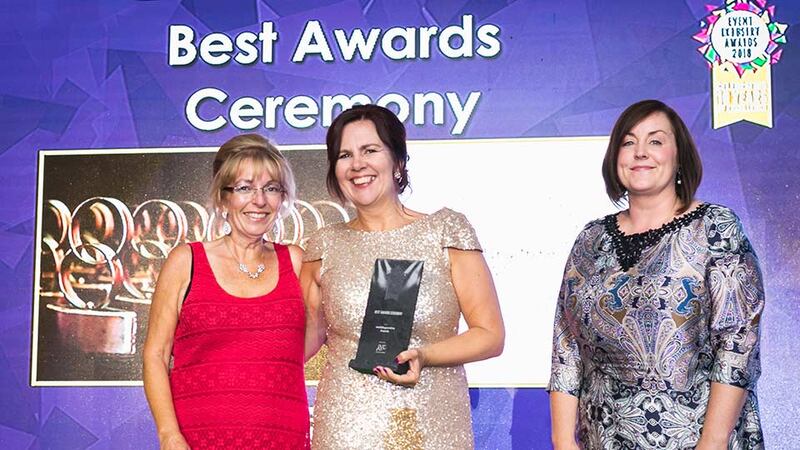 Michael Brady, General Manager, The Helix presents the Best Corporate Event award to James Gavin, Grooveyard Event Management.
