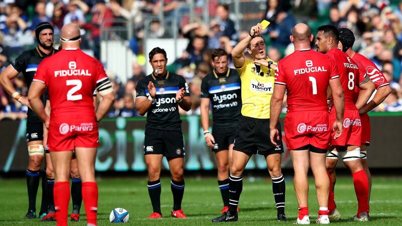 Toulouse’s Jerome Kaino is yellow carded by referee Andrew Brace following a high tackle on Jamie Roberts of Bath during the Champions Cup game at at the Recreation Ground. Photograph: James Crombie/Inpho