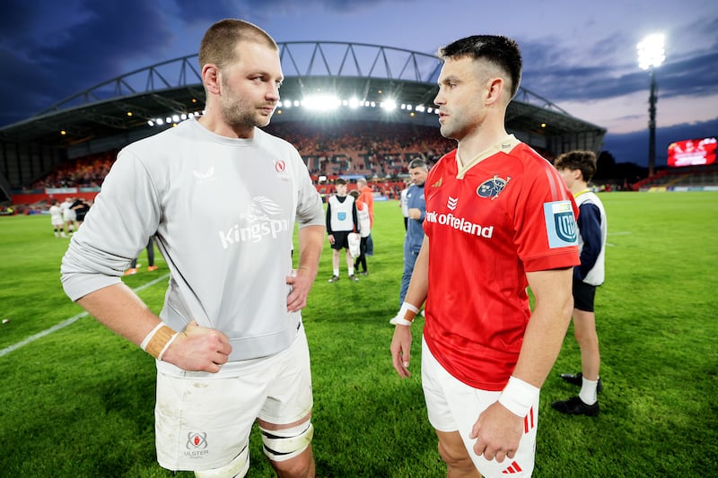 Ulster's Iain Henderson and Munster's Conor Murray after the game. Photograph: Laszlo Geczo/Inpho