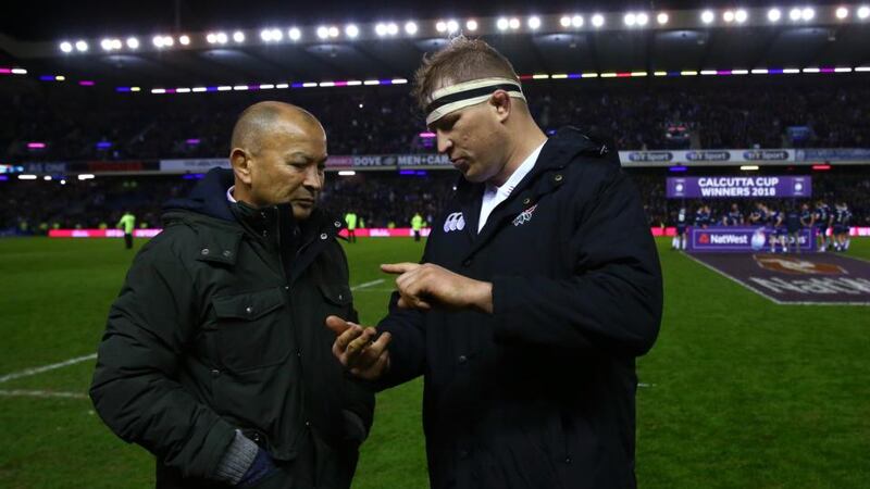Eddie Jones and Dylan Hartley after England’s defeat at Murrayfield. Photograph: Michael Steele/Getty