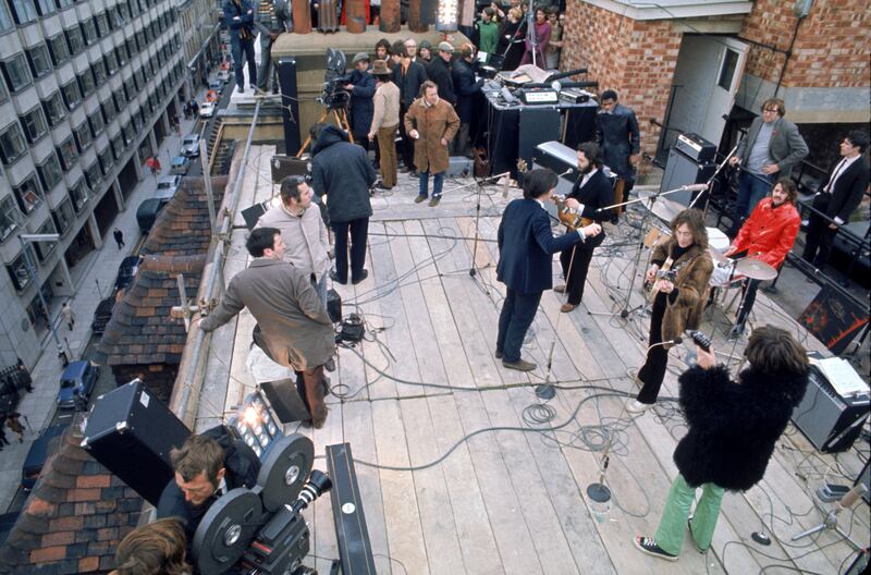 The Beatles on the roof of 3 Savile Row in London. Photograph: Ethan A Russell/Apple Corps Ltd Images/PA Wire
