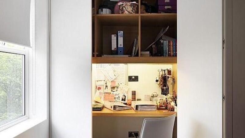 If space is an issue and the bedroom is the only area to work in,  have a desk built into a storage unit that closes up when not in use.