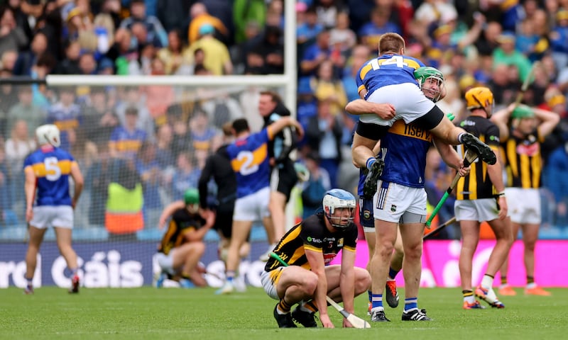 Tipperary’s Noel McGrath celebrates with his brother John McGrath. Photograph: James Crombie/Inpho