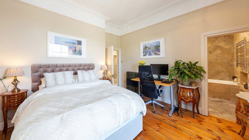 Bedroom with marble-clad en suite