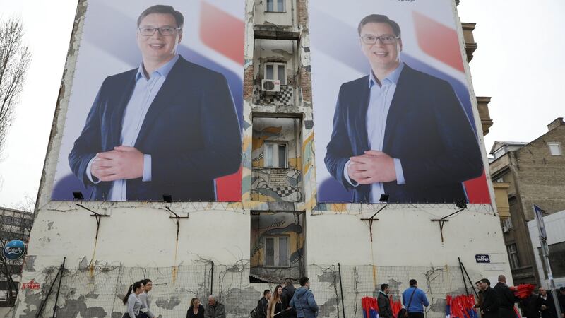 People pass posters of Serbian prime minister Aleksandar Vucic, who is hotly favoured to win this Sunday’s presidential election,  in Novi Sad, Serbia on March 18th.  Photograph:  Marko Djurica/Reuters