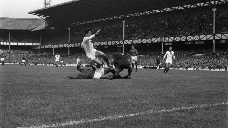 Eusebio is fouled during Portugal’s 1966 World Cup clash with North Korea at Goodison Park. Photograph: Central Press/Getty