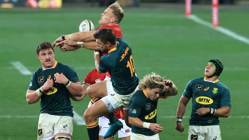 Duhan van der Merwe of the  Lions tries to catch the ball under pressure from South Africa’s  Handré Pollard during the second Test. Photograph:  David Rogers/Getty Images