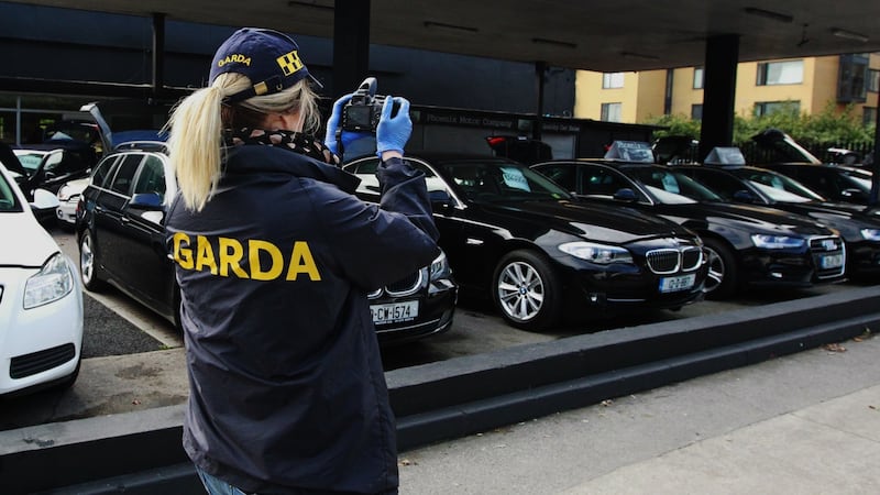 About 20 premises in Dublin - including private homes and commercial properties connected with the motor trade - were searched by gardaí during an operation against organised crime on Tuesday. Photograph: Padraig O’Reilly.