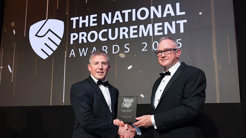 Michael O'Callaghan, awards judge, presents the best green procurement project of the year award to Paul Farrelly, Transport Infrastructure Ireland.