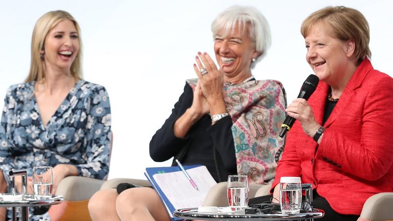 Ivanka Trump, with International Monetary Fund (IMF) managing director Christine Lagarde and German Chancellor Angela Merkel. Photograph:  Sean Gallup/Getty Images
