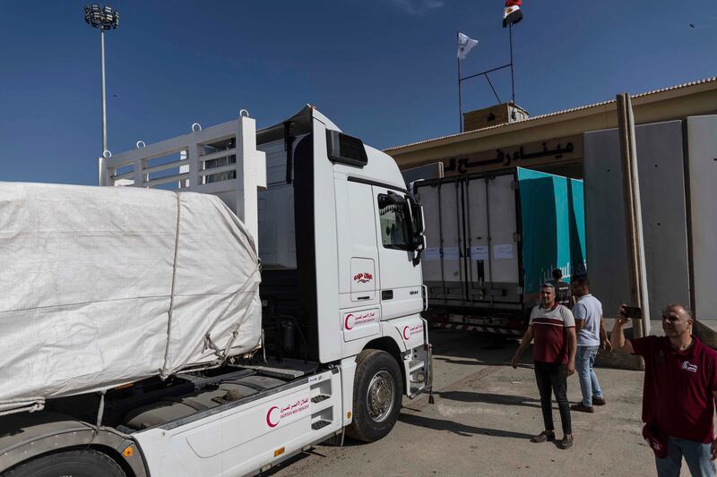 Aid convoy trucks cross the Rafah border into Gaza from the Egyptian side on Saturday. The aid convoy was organised by a group of Egyptian NGOs. Photograph: Mahmoud Khaled/Getty Images