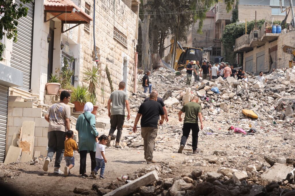 Palestinians inspect the damage after a 10-day Israeli military operation near the West Bank city of Jenin on Friday. Photograph: Alaa Badarneh/EPA