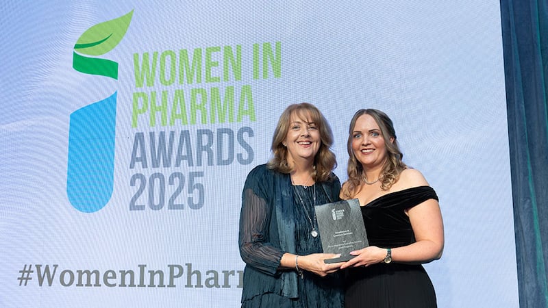 Miriam Foley, managing director at Cronin Group, presents the excellence in contract services award to Janet Fitzgerald, Acorn Regulatory Consulting Services