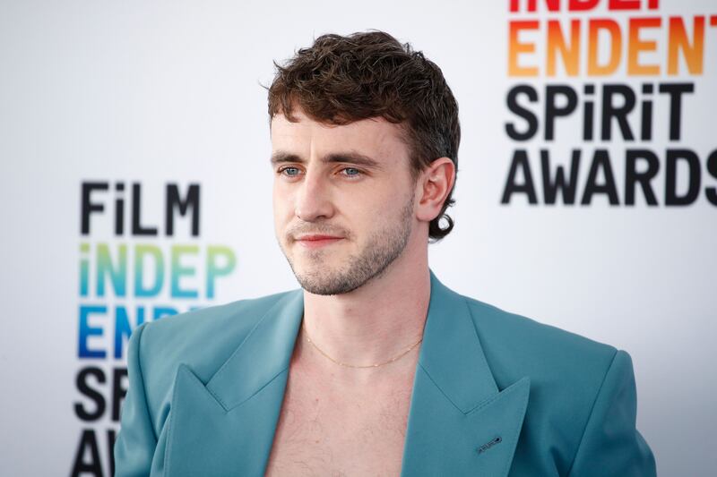 Paul Mescal wore an oversized blue blazer and a wide-leg trouser combo from Gucci for the Independent Spirit Awards. Photograph: Caroline Brehman/EPA