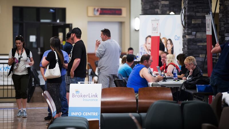 Fort McMurray wildfire evacuees wait to speak with insurance company representatives at an evacuation centre in Lac La Biche, Alberta, Canada, on Saturday.  Photograph: Darryl Dyck/Bloomberg