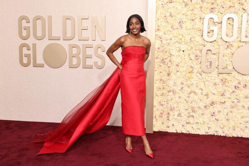 Ayo Edebiri wearing a strapless Prada tube dress. Photograph: Amy Sussman/Getty Images