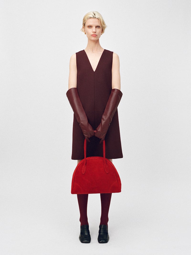 Halterneck dress €89, suede bowling bag €279