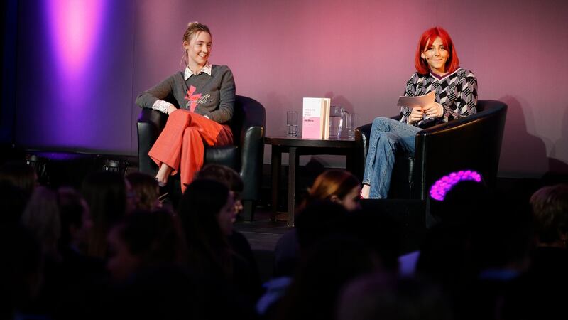 Saoirse Ronan and Scarlett Curtis, editor of Feminists Don’t Wear Pink,  at Scoil Chaitríona, Glasnevin, Drumcondra, Dublin. Photograph: Nick Bradshaw/The Irish Times