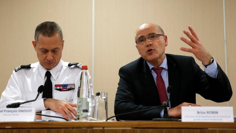 Colonel Francois Daoust, Head of Criminal Research Institute of French Gendarmerie, and French prosecutor of Marseille Brice Robin hold a press conference in Paris. Photograph: EPA