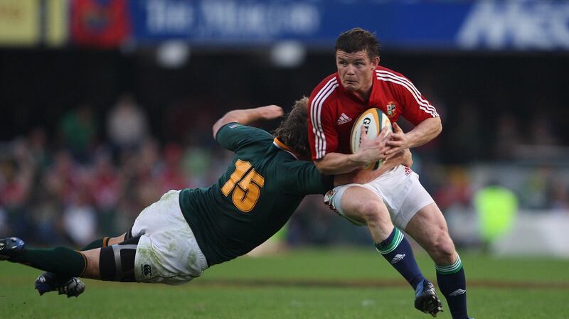 Brian O’Driscoll carries during the opening Test of the 2009 Lions tour to South Africa. Photograph: Billy Stickland/Inpho