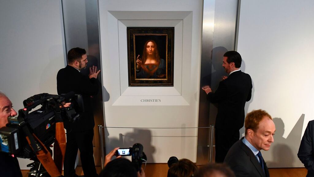 Security personnel stand next to Leonardo da Vinci’s ‘Salvator Mundi’ after it was unveiled at Christie’s in New York on October 10th. Photograph: Jewel Samad/AFP/Getty Images