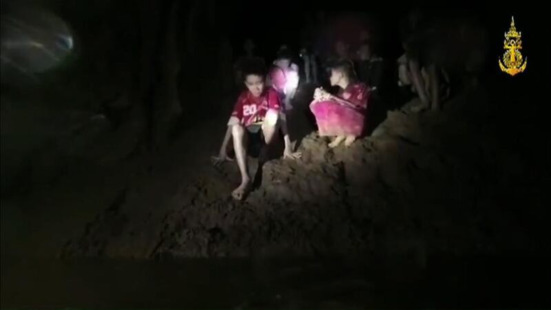 Thai cave rescue: some of the Wild Boars team after they were finally found. Photograph: Royal Thai Navy/AFP/Getty