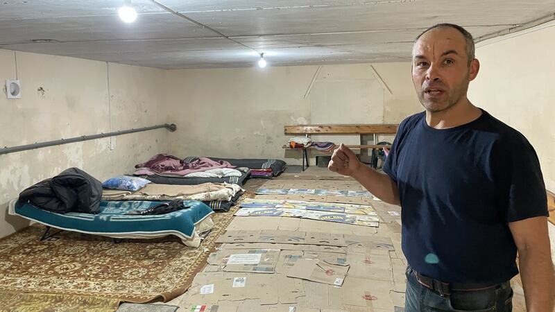 Vitaliy Butochel in the basement of a church hall in Bashtanka, southern Ukraine, where locals sheltered from Russian shelling. Photograph: Daniel McLaughlin
