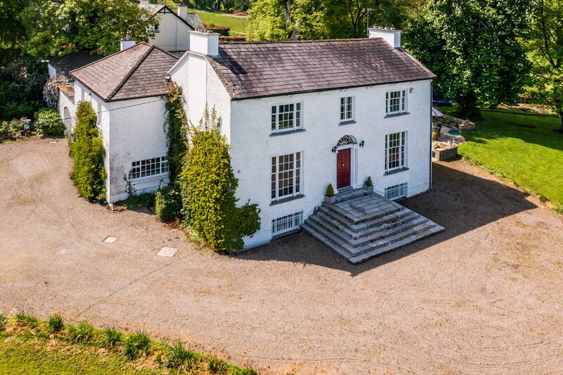 The Georgian house lies two stories over basement 