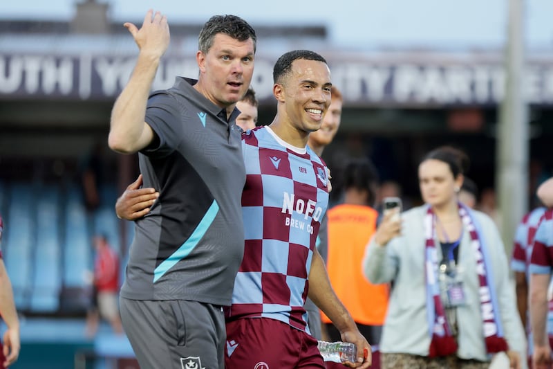 Drogheda United manager Kevin Doherty celebrates with Douglas James-Taylor after the win against Sligo Rovers. Photograph: Laszlo Geczo/Inpho