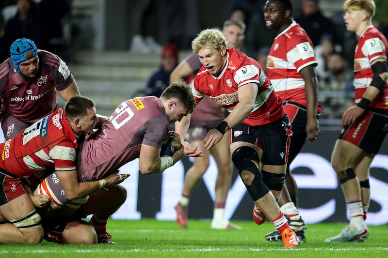 Munster's Ruadhán Quinn scores a try against Gloucester. Photograph: Billy Stickland/Inpho