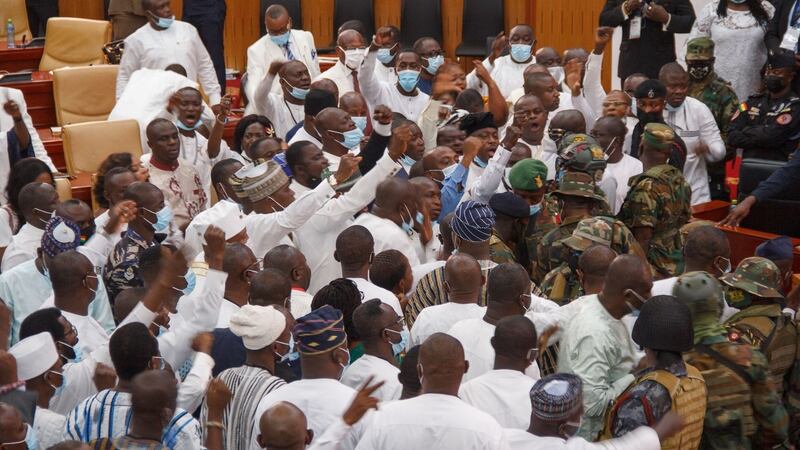 Soldiers are seen at the parliament of Ghana in Accra amid a scuffle between rival politicians. Photograph: Nipah Dennis/AFP via Getty Images