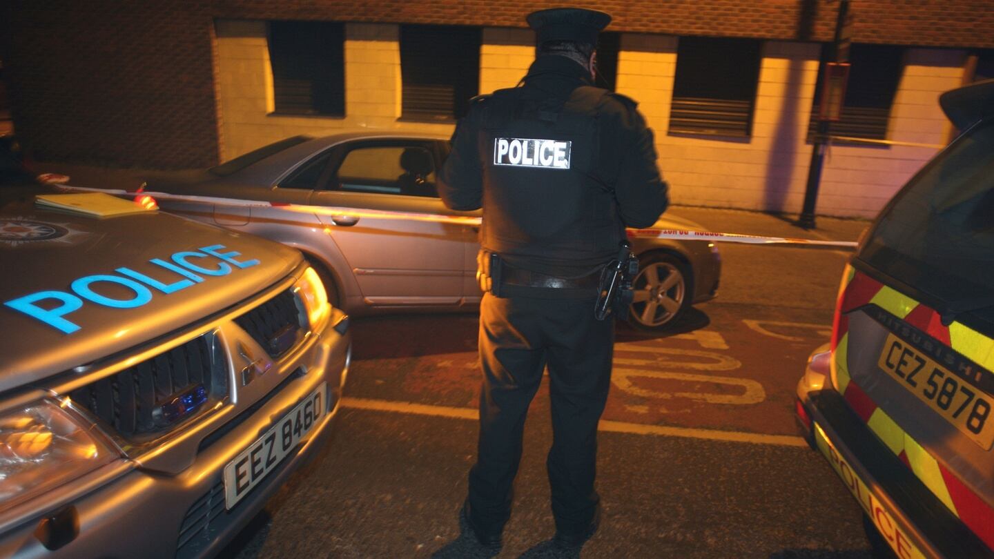 PSNI on the Antrim Road after a police officer was shot in the arm at a petrol station in north Belfast. Photograph: PA