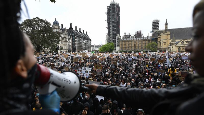 Thousands of people take part in a ‘Black Lives Matter’  protest at Parliament Square in London. Photograph: Andy Rain/EPA