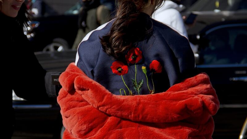 A silk bomber jacket with poppy detail seen at New York Fashion Week. Photograph: Georgie Wileman/Getty Images