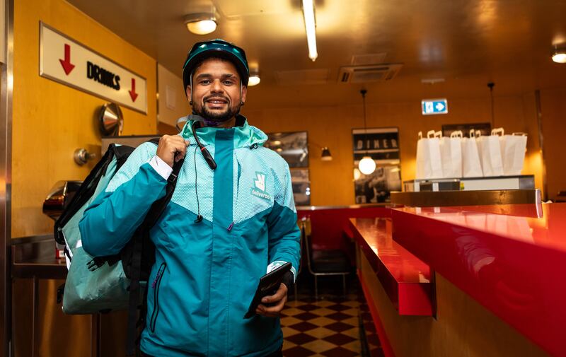 Leonardo is one of the Deliveroo riders picking up orders at Wowburger. Photograph: Evan Treacy for The Irish Times 