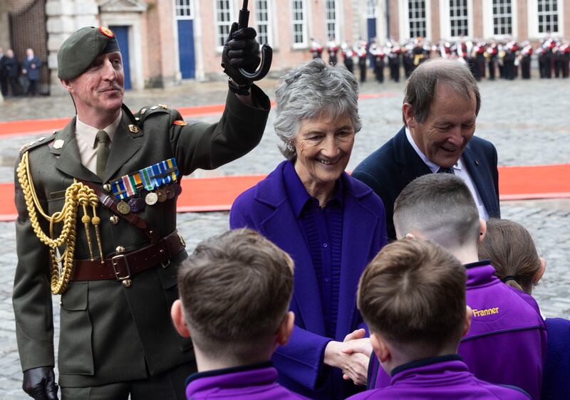 President Catherine Connolly and her husband, Brian McEnery, greet children from Francis Street national school at Dublin Castle. Photograph: Sam Boal/Collins  

