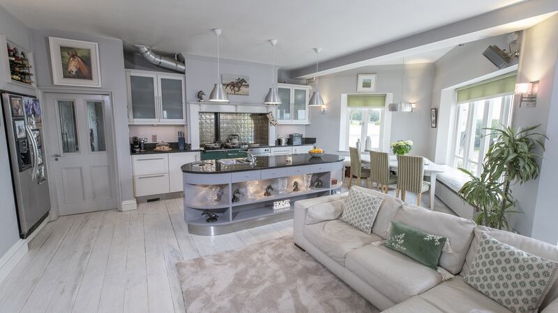 The open-plan kitchen/dining and living area