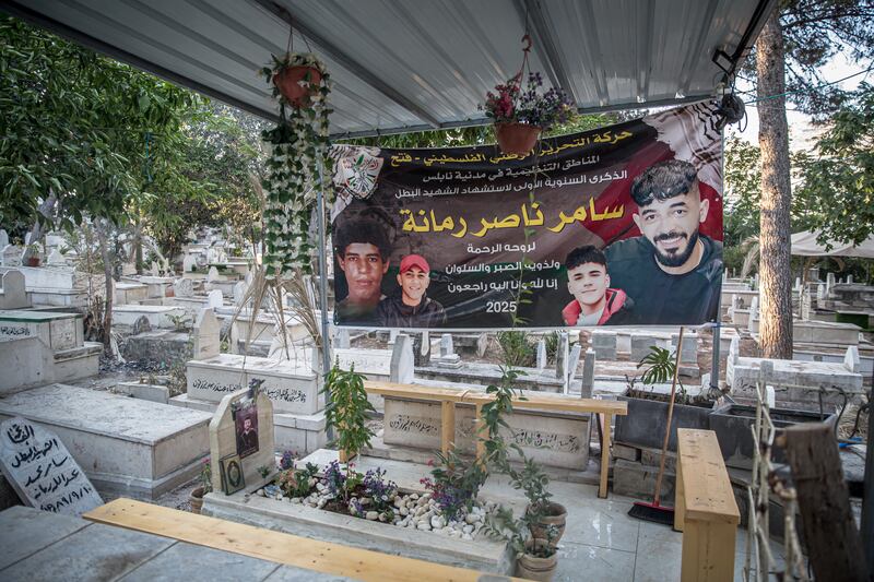Posters in a cemetery in Nablus commemorate deceased Palestinians. Photograph: Sally Hayden