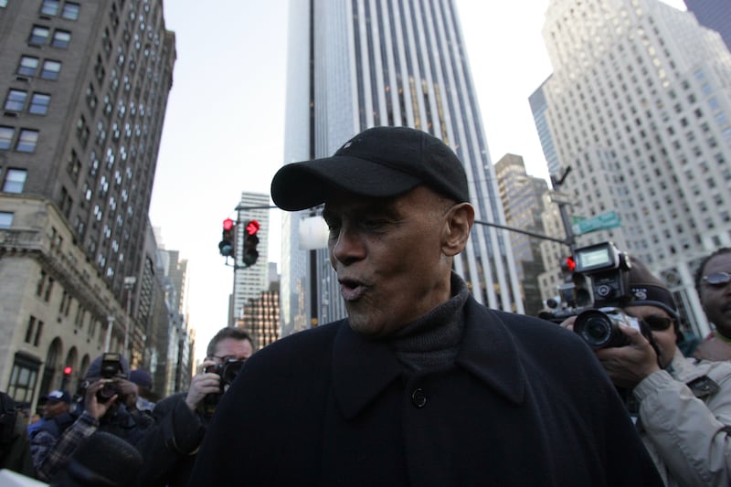 Harry Belafonte during a December 2016 protest against the fatal police shooting of Sean Bell, an unarmed black man who was killed on his wedding day. Photograph: Suzanne DeChillo/The New York Times
                      