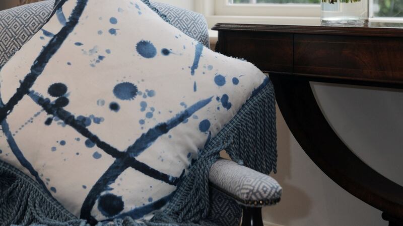 Lucy Nagle’s  cushions made with classic tassel edging, but in a modern blue tie-dye fabric  lift the whole sitting room. Photograph: Aidan Crawley