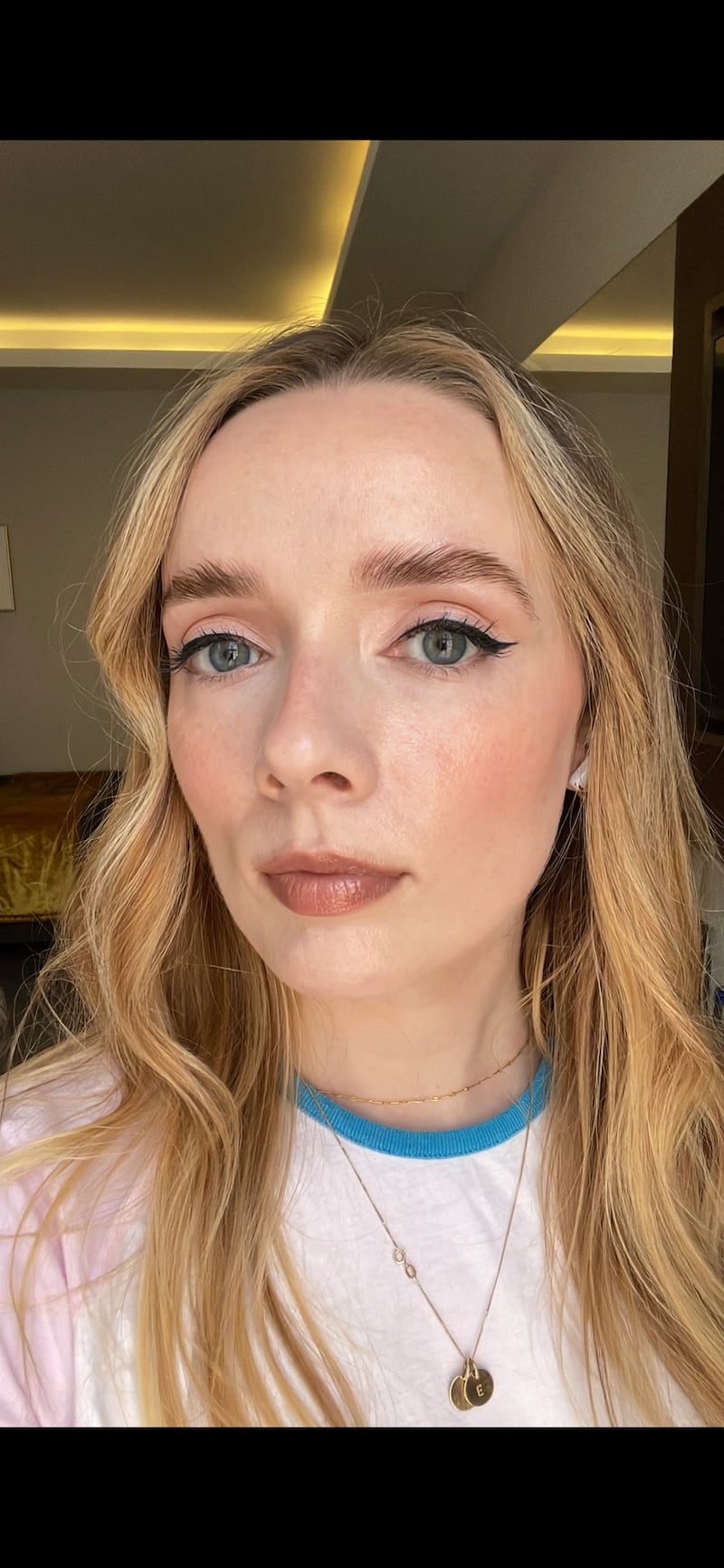 Laura Kennedy with her just-laminated brows, a little bit slick and more intense in tone