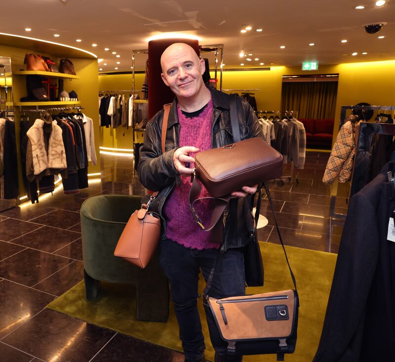 Conor Pope looking at some manbags in Brown Thomas, Grafton Street, Dublin. Photograph: Dara Mac Dónaill
