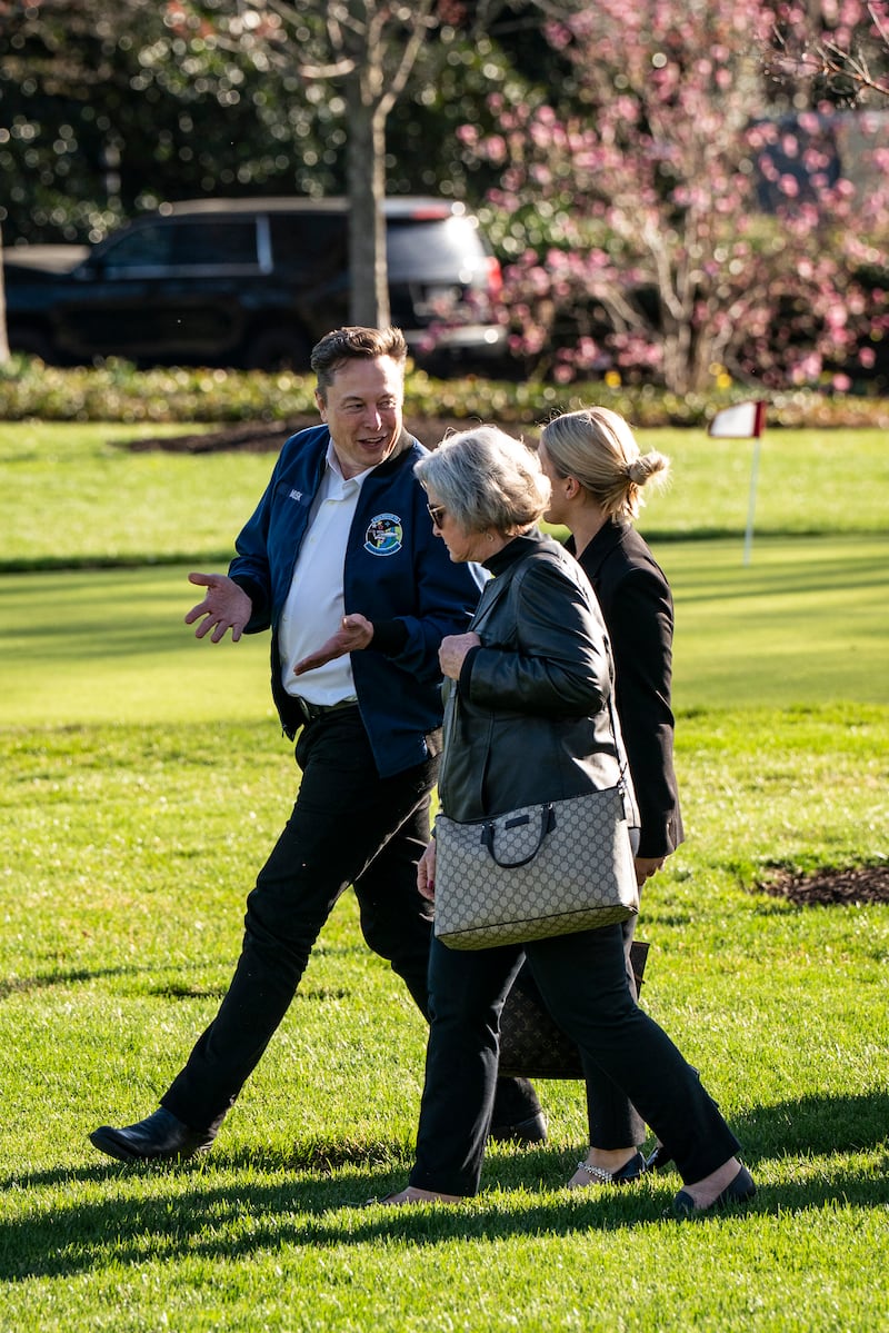 Elon Musk speaks with Susie Wiles, the White House chief of staff.  Photograph: Haiyun Jiang/The New York Times                     