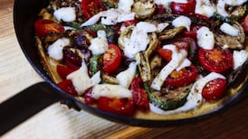 Socca pizza with seasonal vegetables and cheese