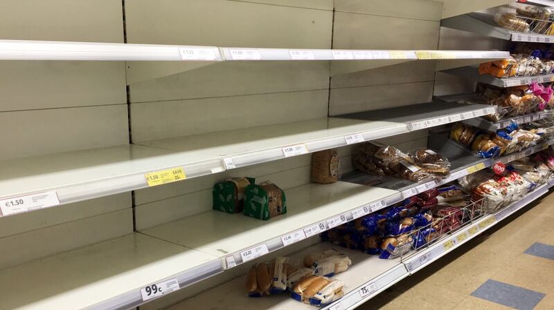 Empty bread shelves in Tesco on   Baggot Street, Dublin 2,  ahead of Storm Emma. Photograph:  Gareth Chaney Collins