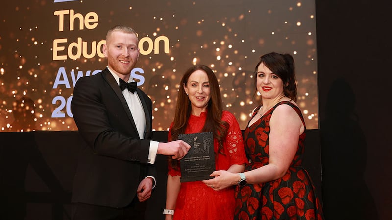 Neil Wall, community director, Business River, presents the best collaboration award - domestic (public good, culture & social impact) award to Natalie Walsh and Naomi Hanlon, University of Galway