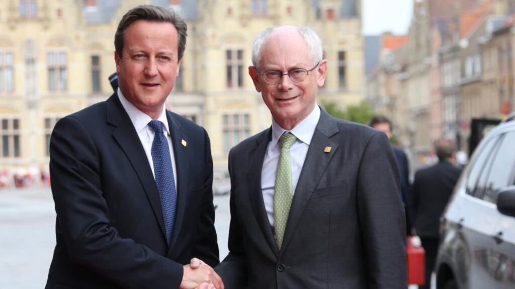 British prime minister David Cameron (left) is welcomed by European Council president Herman van Rompuy prior to a ceremony marking the centenary of the outbreak of the first World War, in Ypres, Belgium, yesterday. Photograph: EPA/Olivier Hoslet